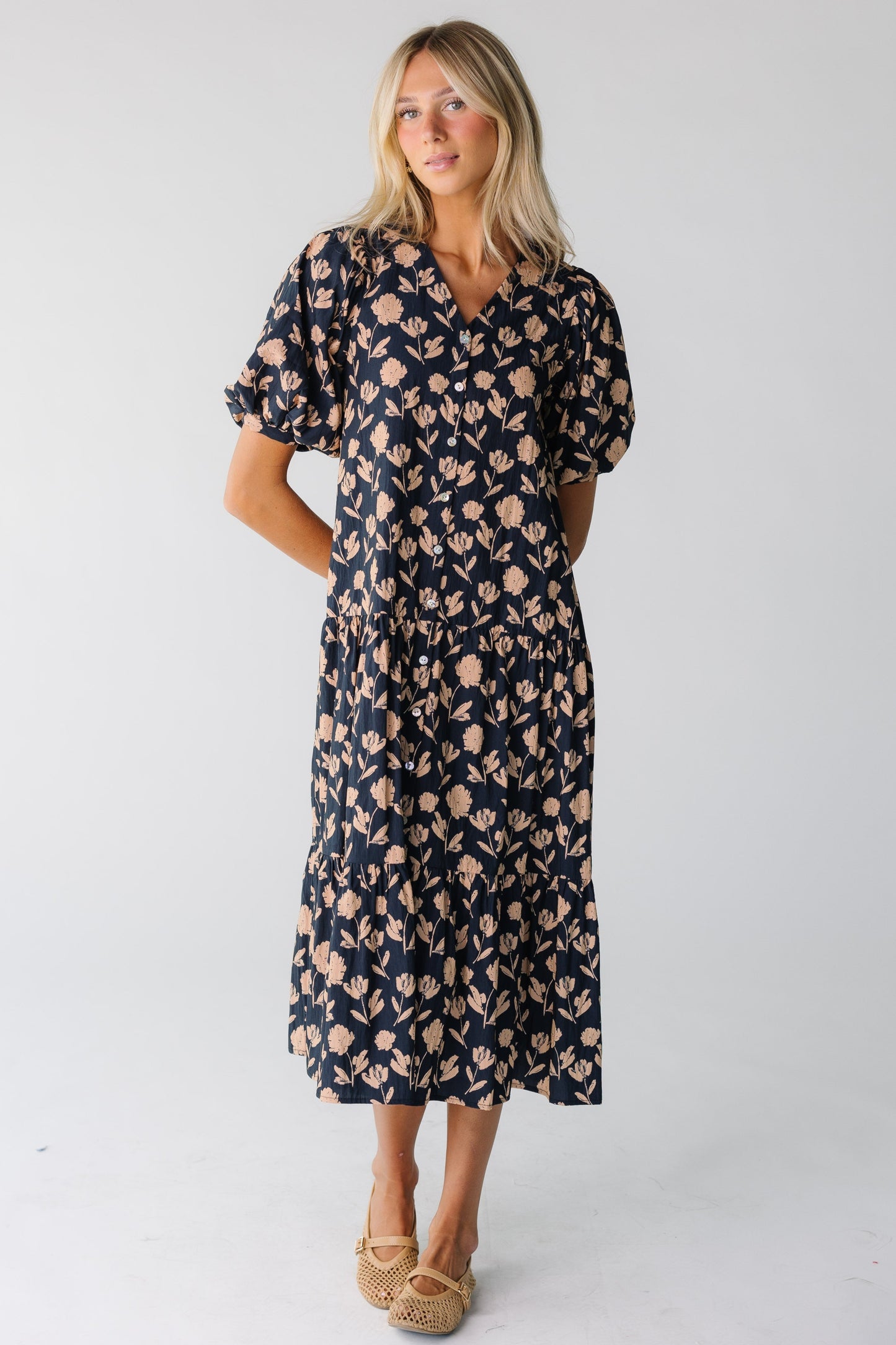 Modest women's midi dress with V-neckline and short sleeves in navy print