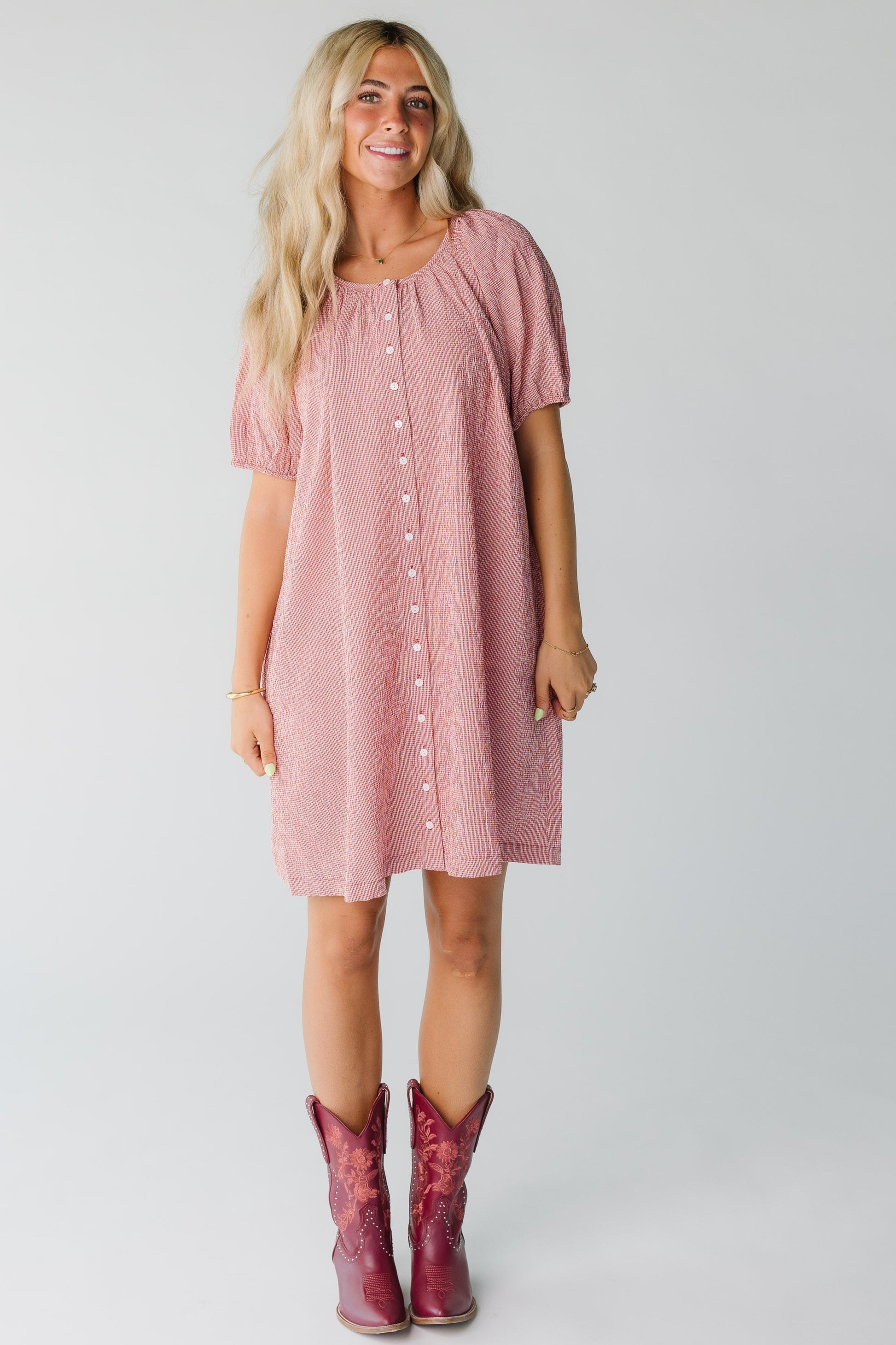 Modest women's red gingham dress with round neckline and short puff sleeves