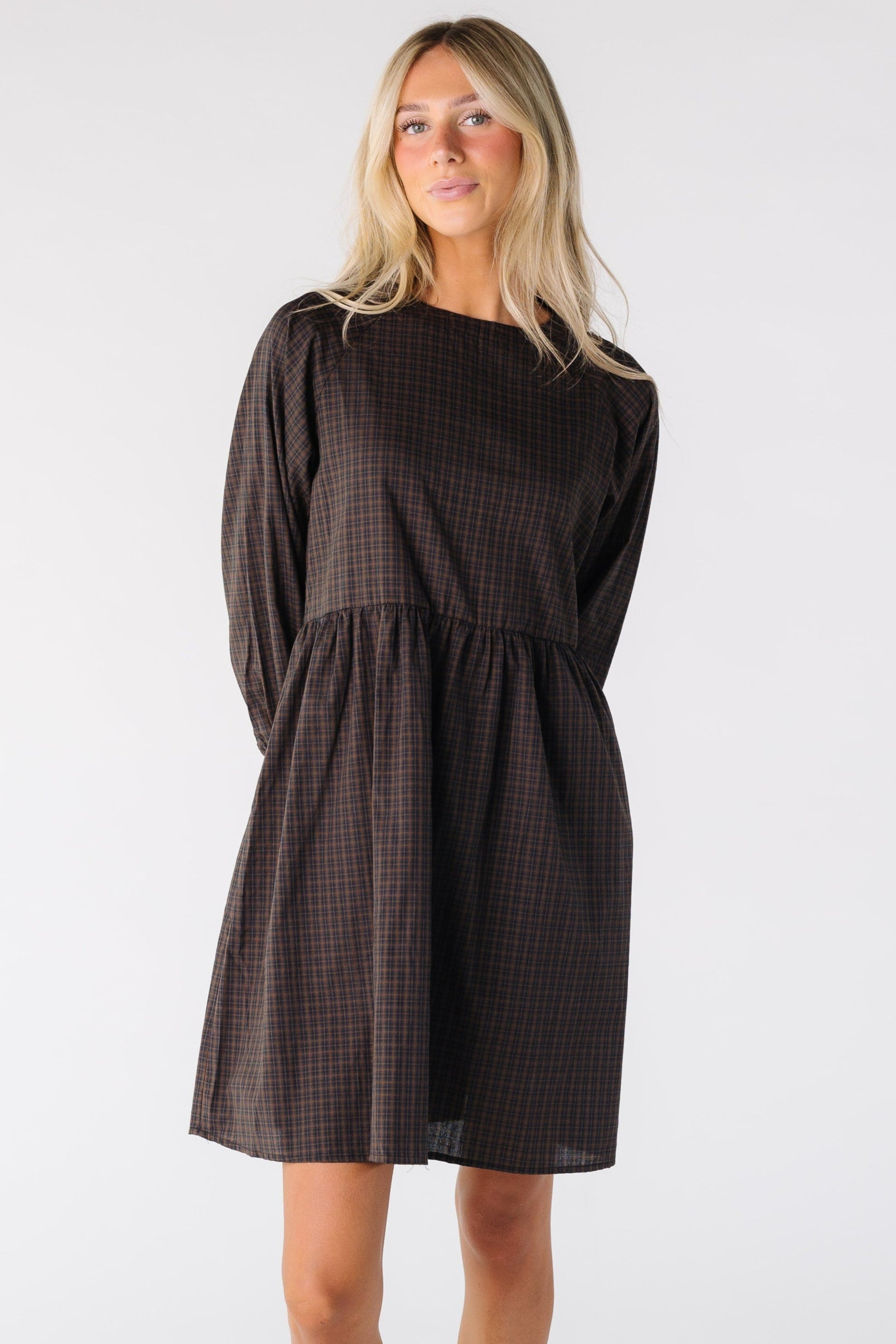 Modest women's brown plaid dress with long sleeves