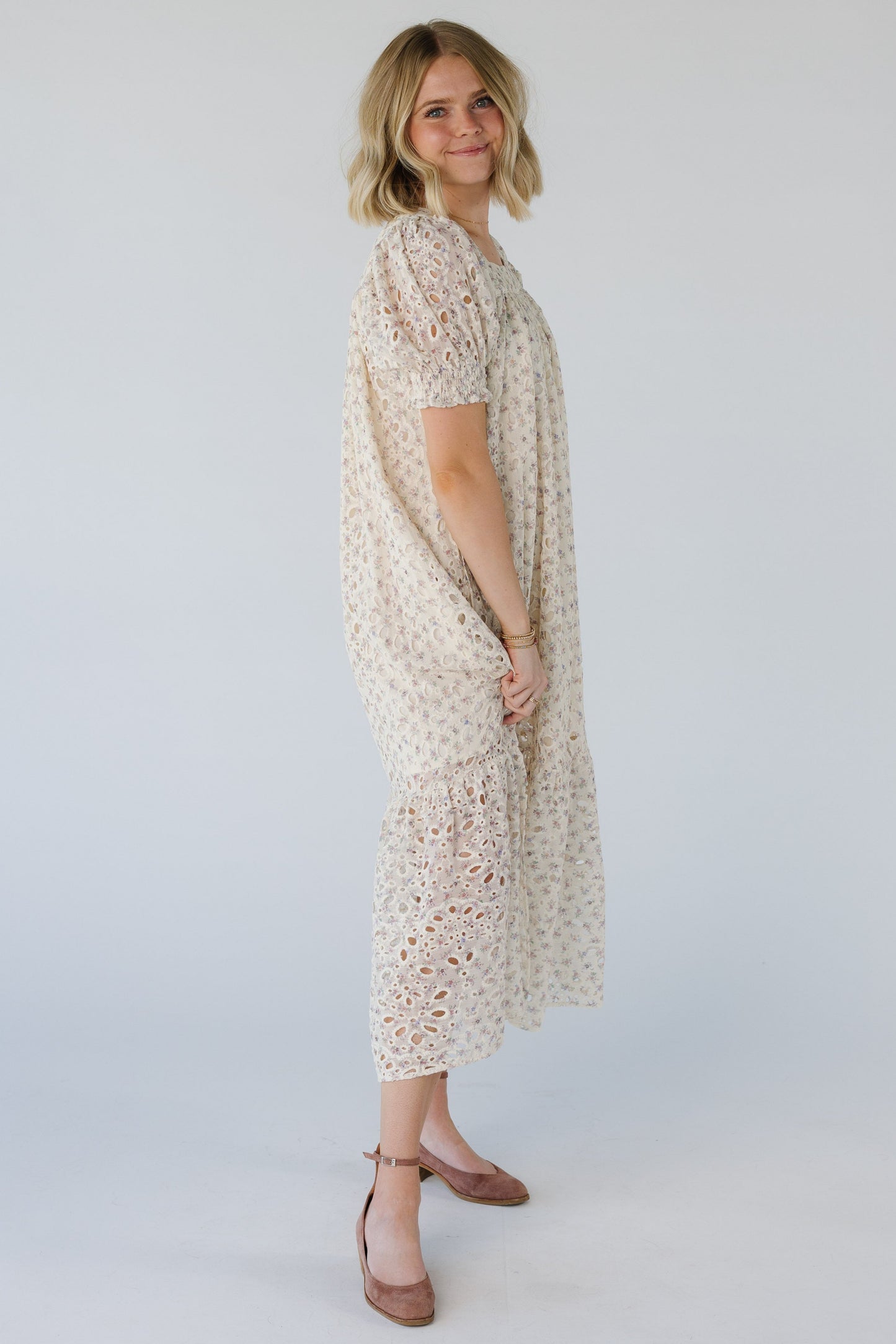 Side view of ivory eyelet midi