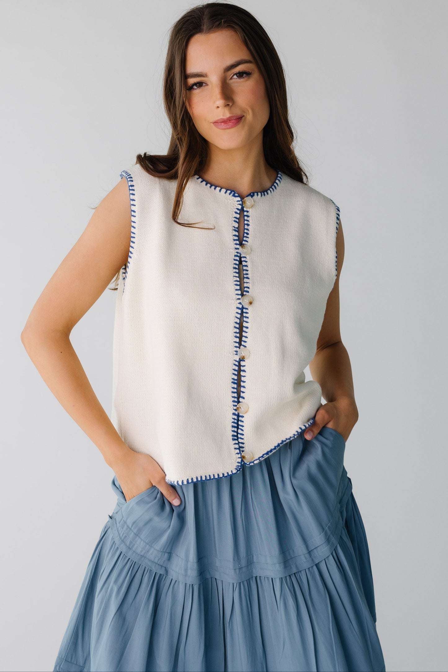 White sweater button down sweater vest