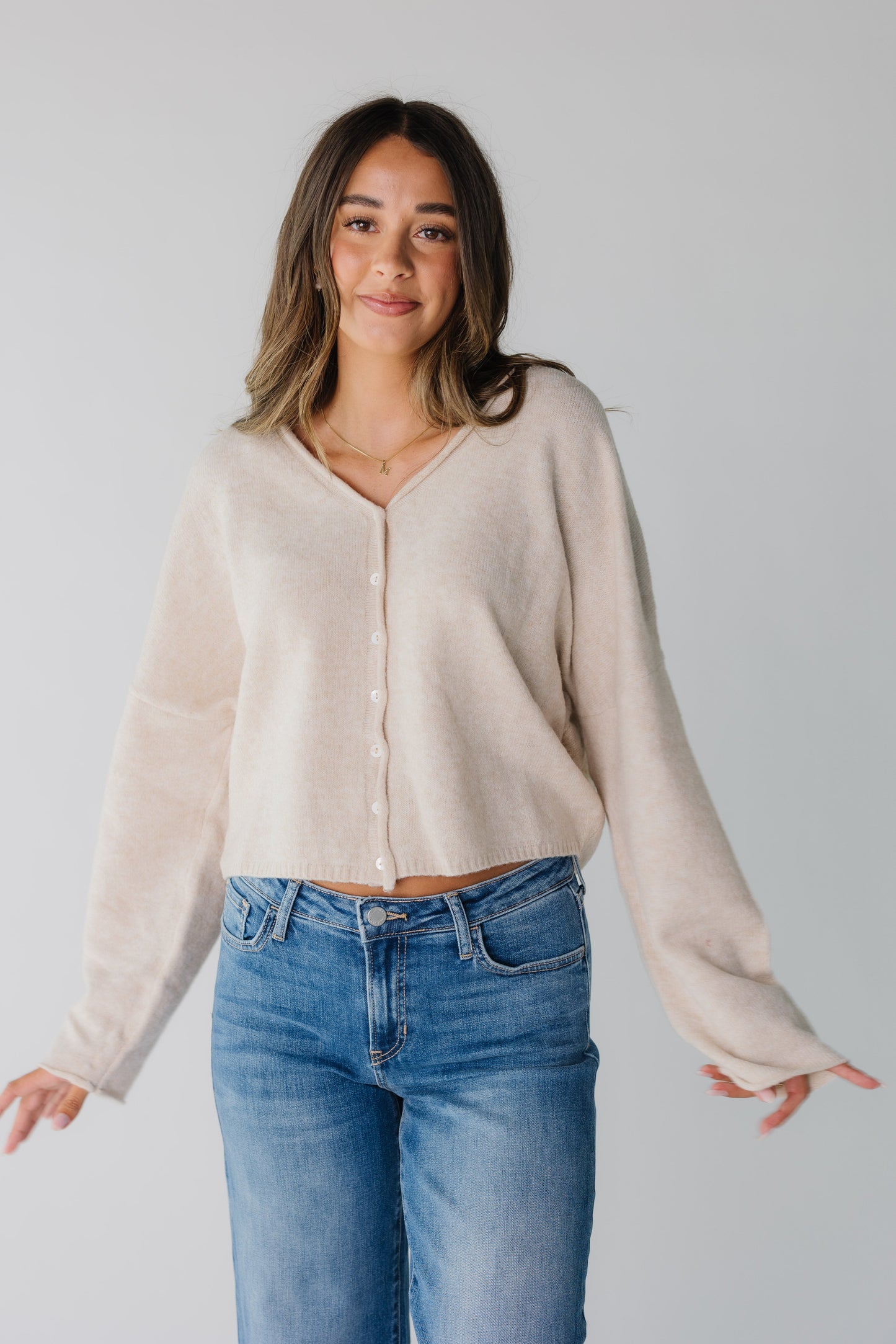 Loose fitting women's cream cardigan