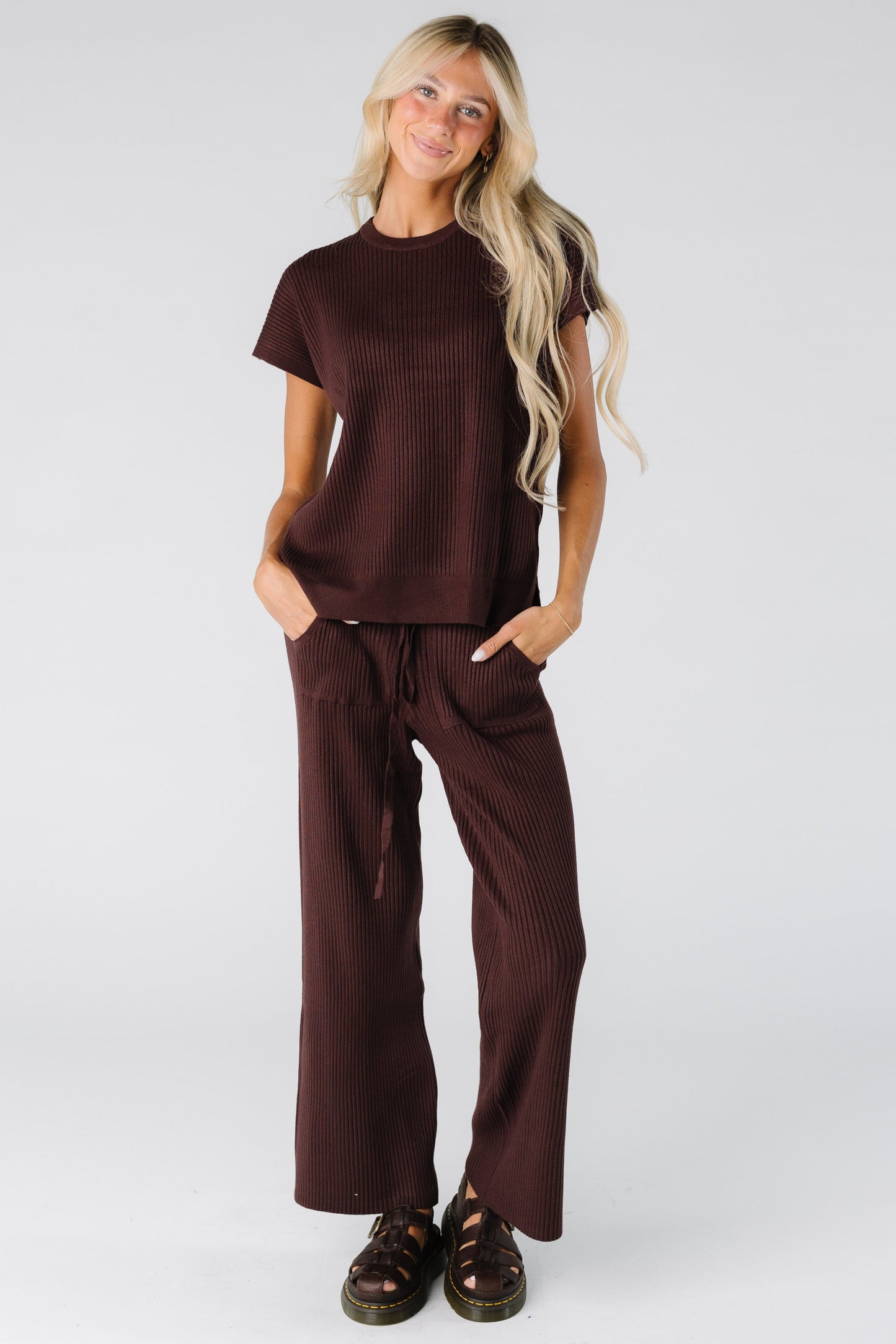Woman wearing a brown ribbed sweater set