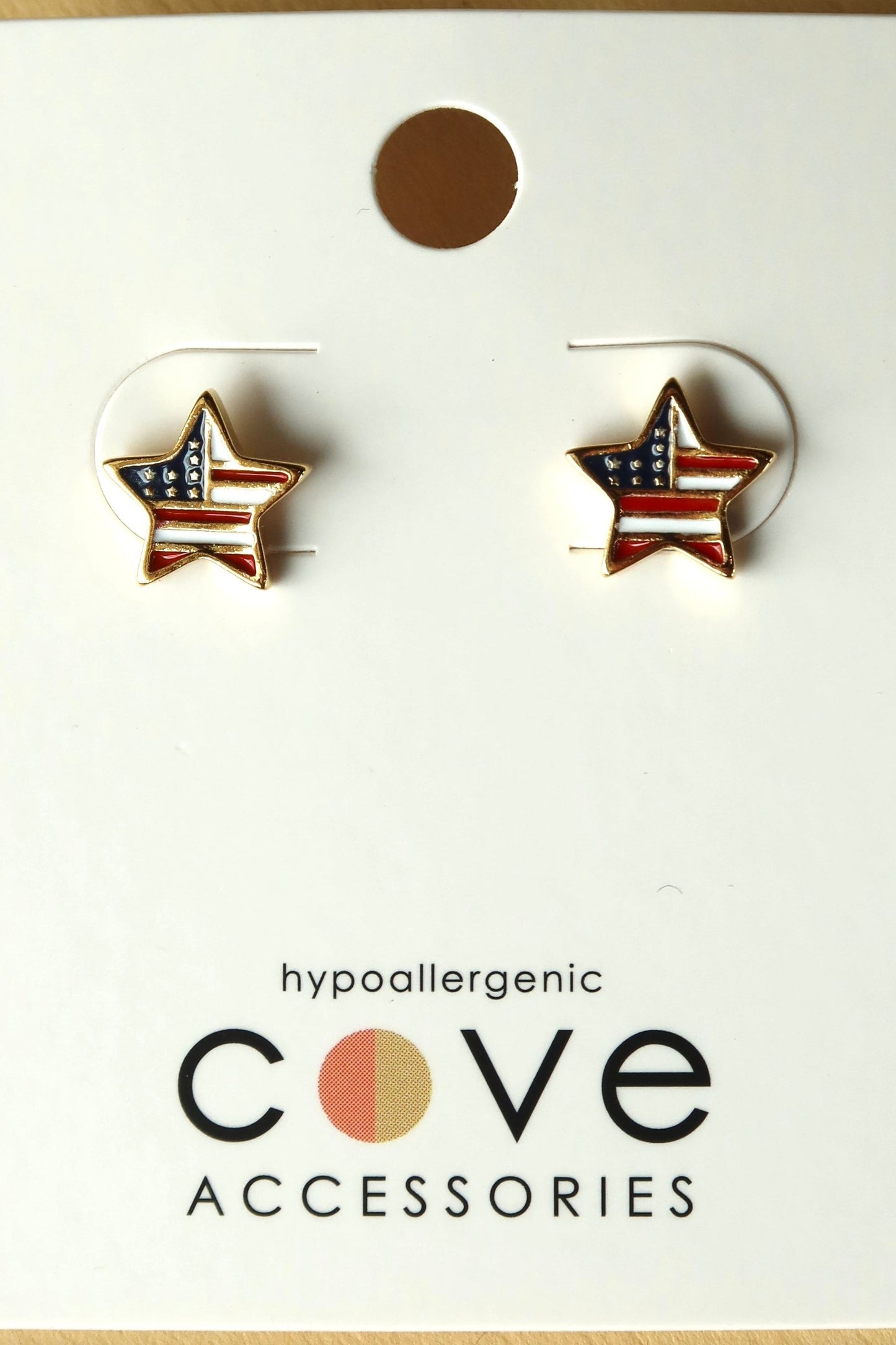 Gold plated star shape star earrings with a USA flag pattern on the stars.
