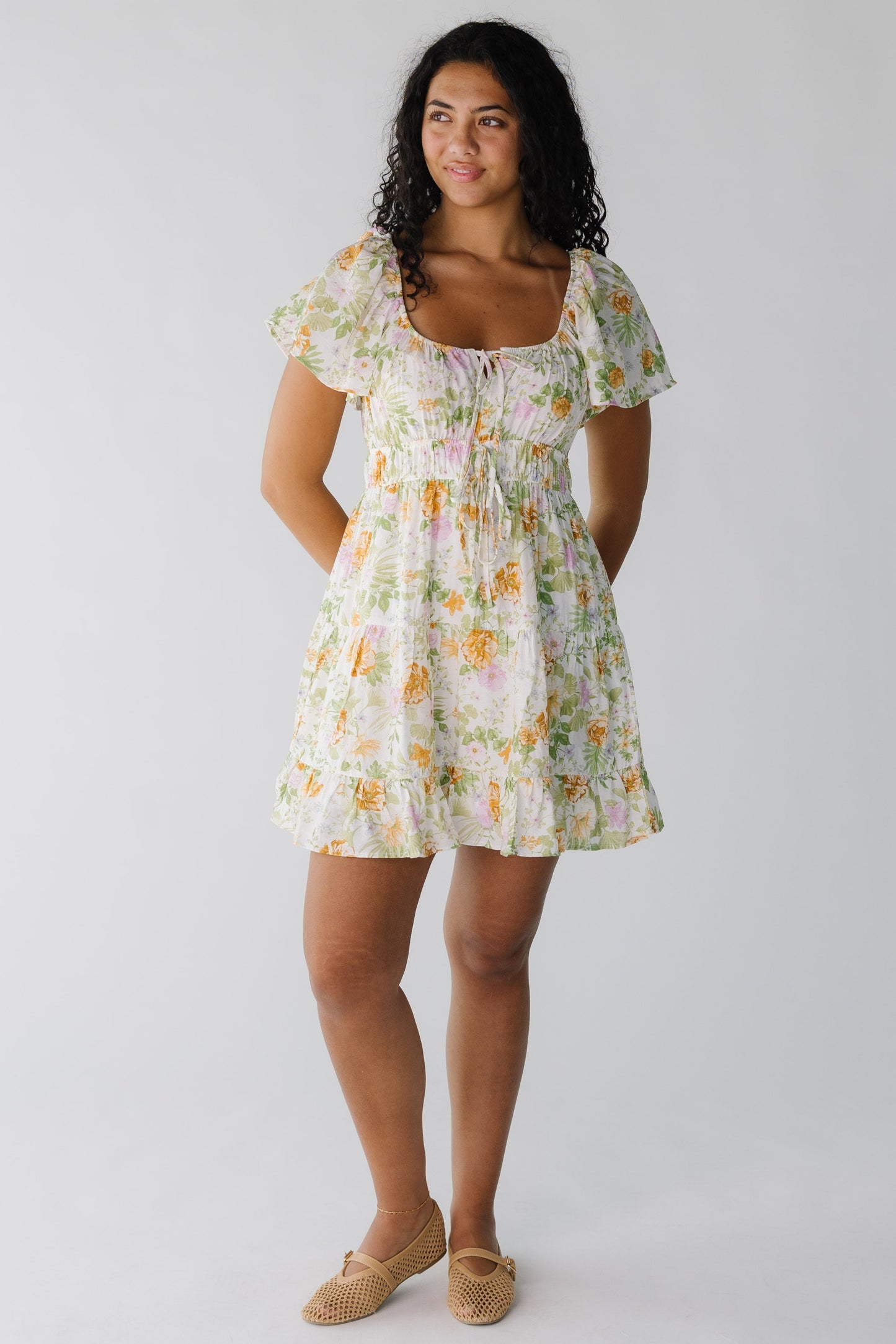 Ivory floral midi dress with elastic waist and short sleeves