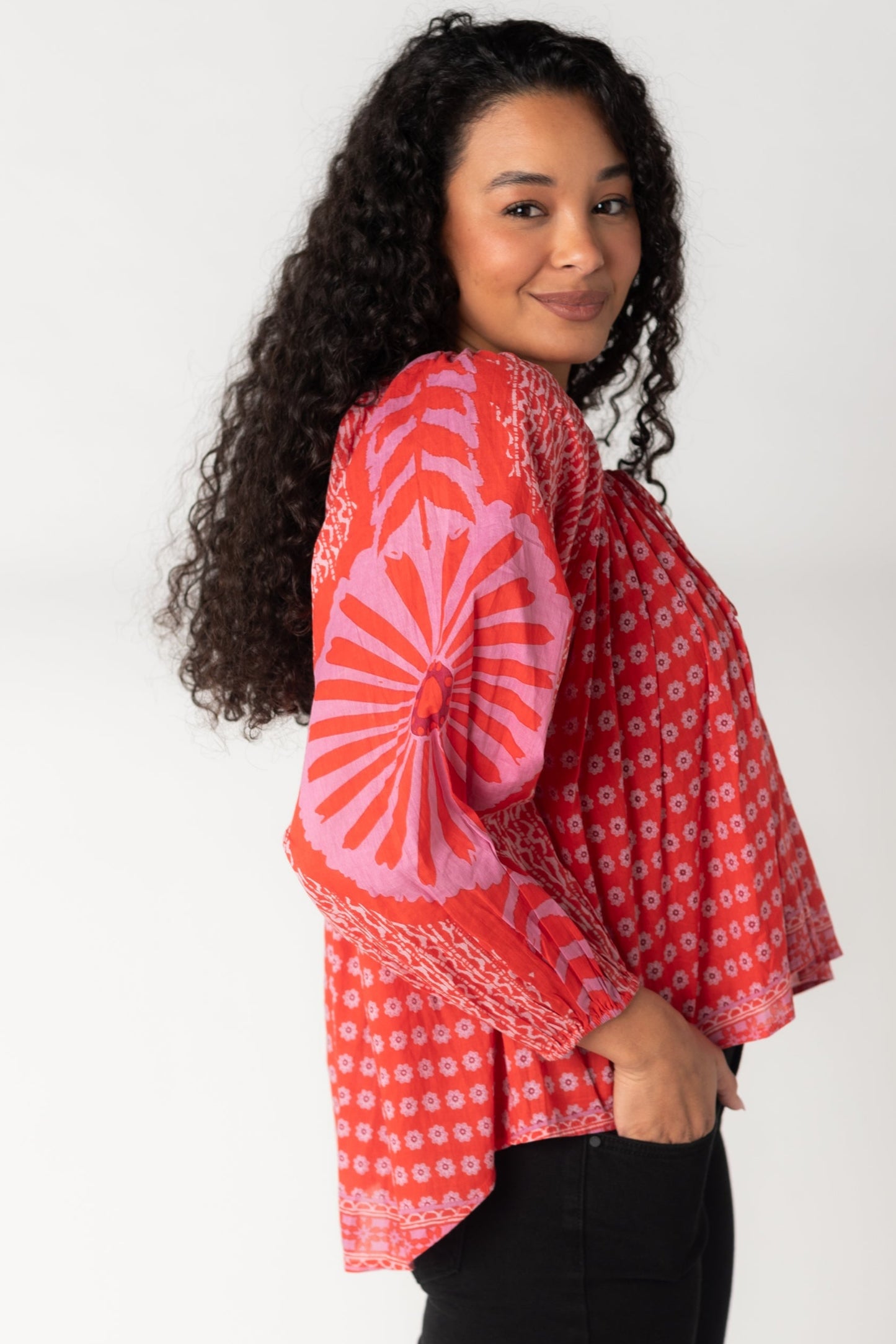 Side view red and pink floral flowy top