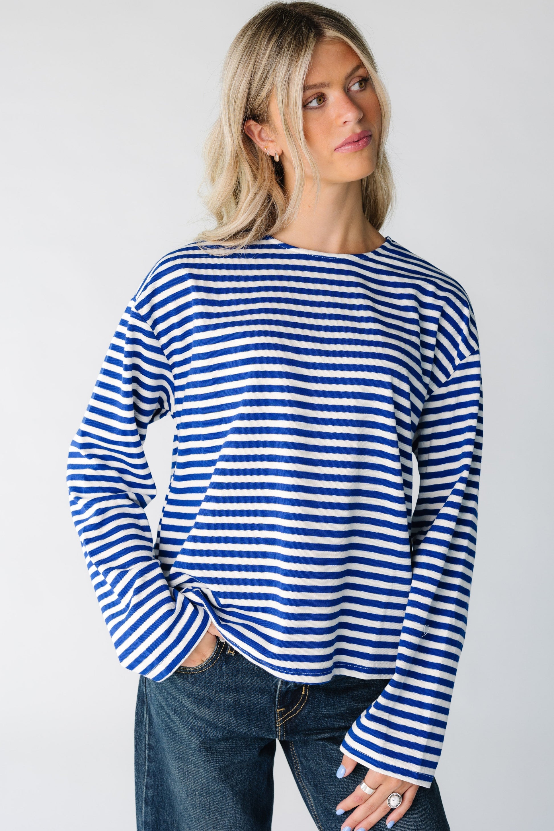 Modest women's blue and white stripe top with long sleeves