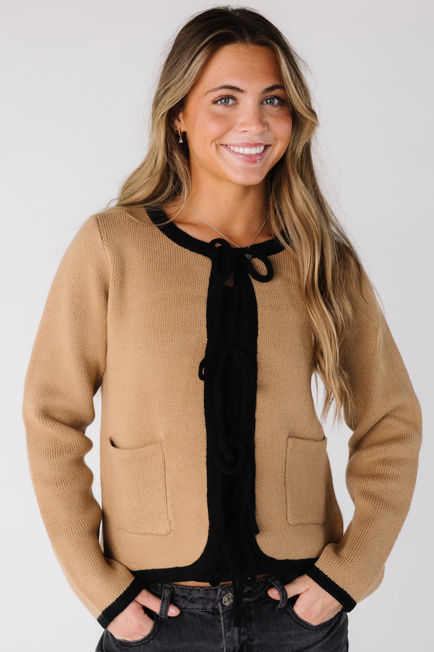 Modest long sleeve cardigan with round neckline and long sleeves in camel