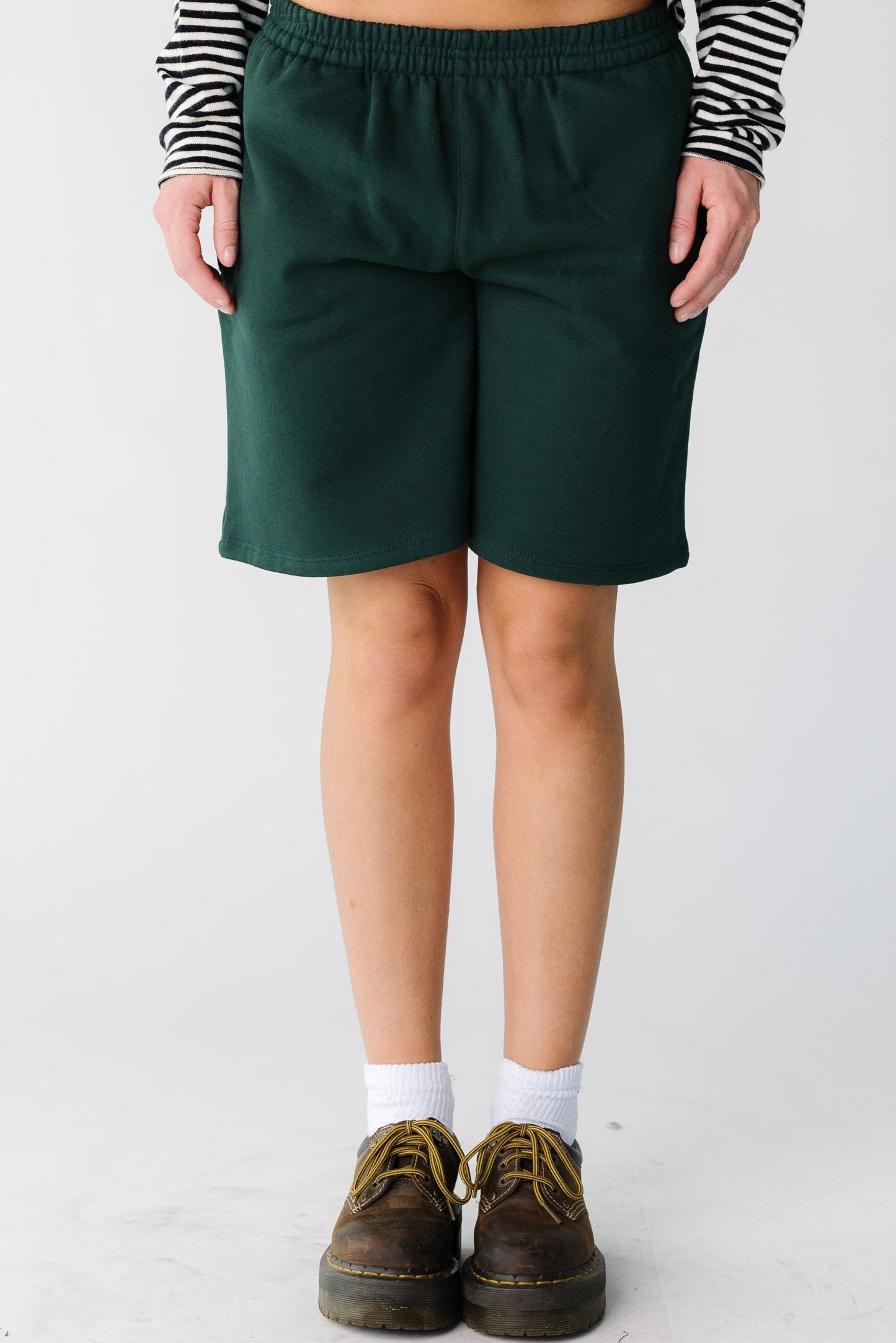 Modest Bermuda length shorts in deep green