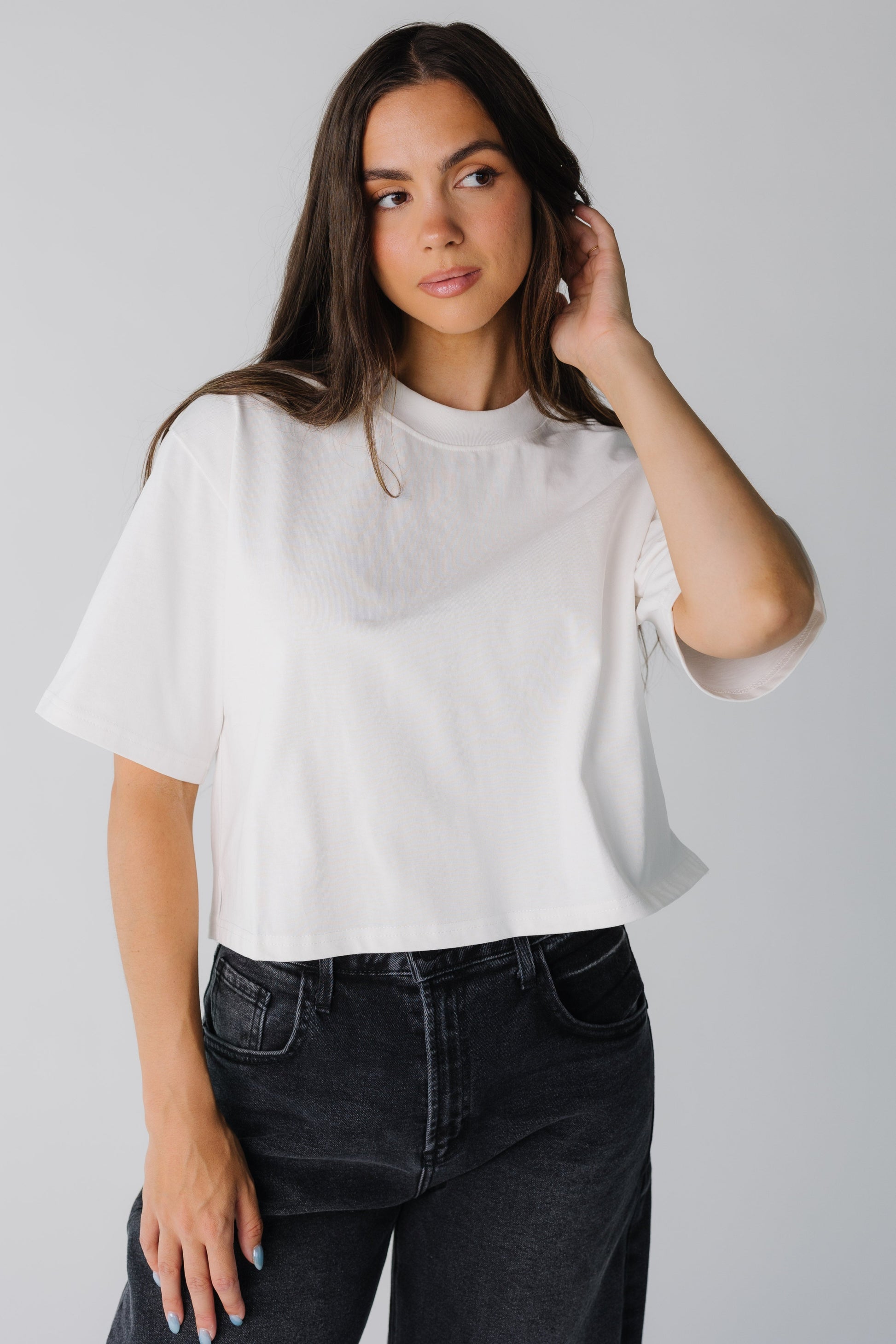 White women's top with elbow length sleeves