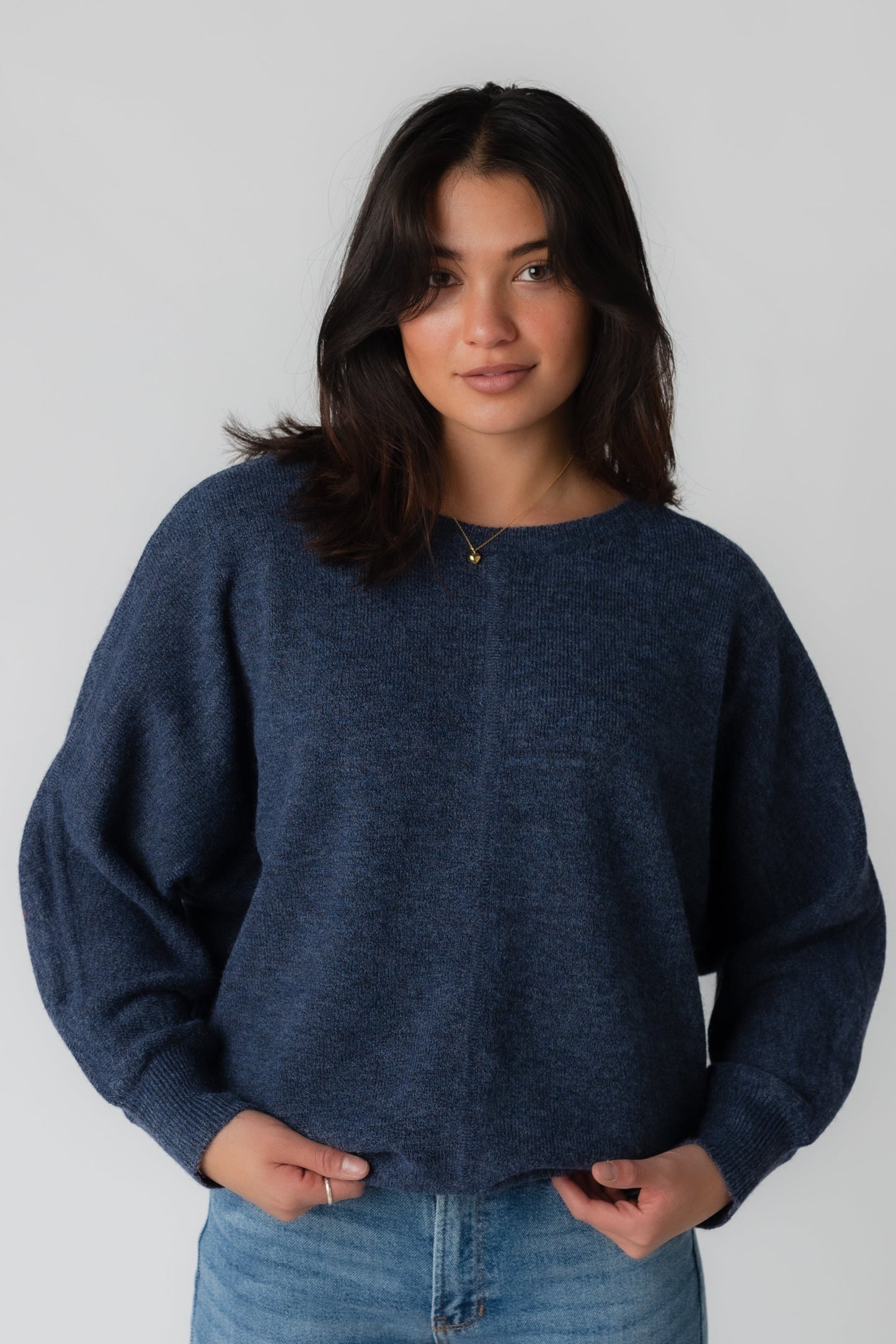 Navy long sleeve looses fitting sweater with crew neckline