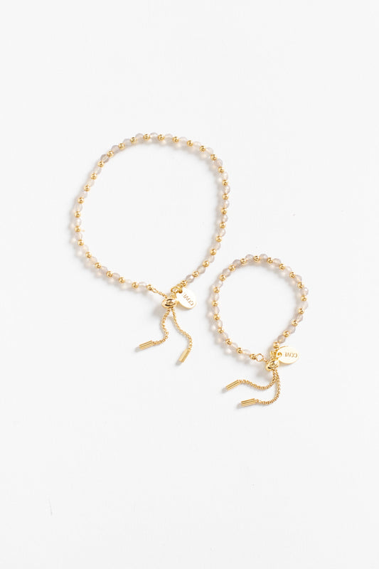 Baby bracelet in topaz and gold
