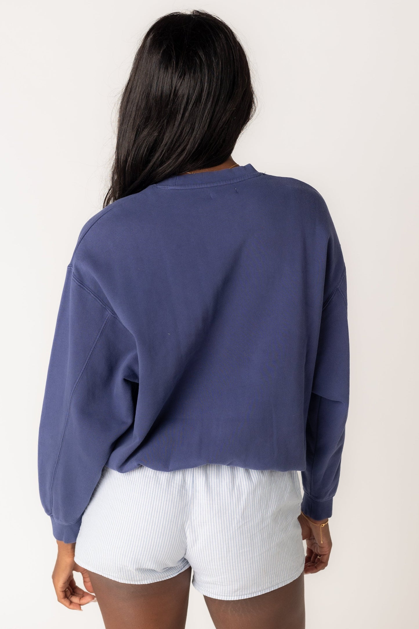Back view of navy Billabong sweatshirt in navy