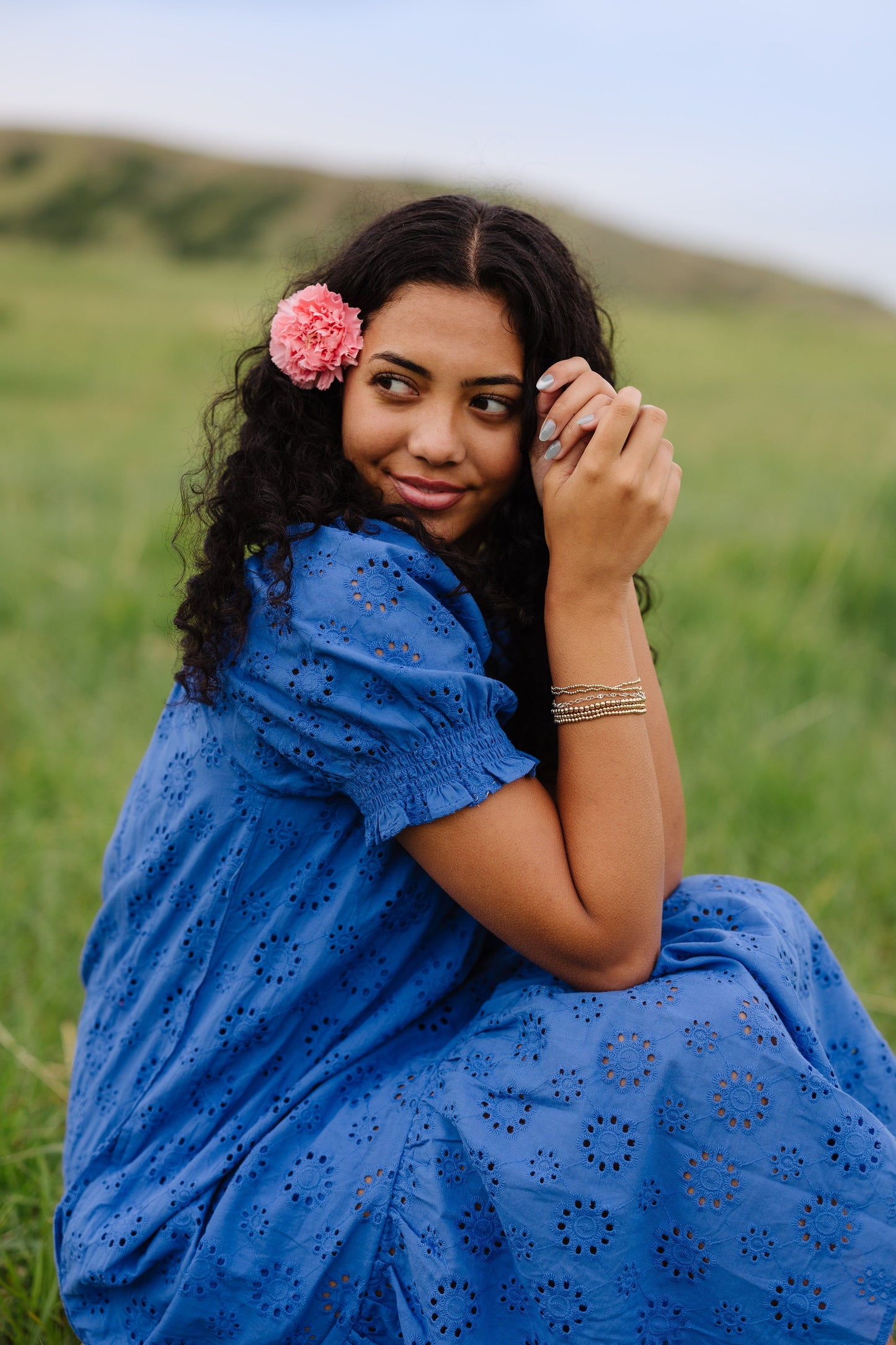 Close view of blue eyelet dress with short sleeves