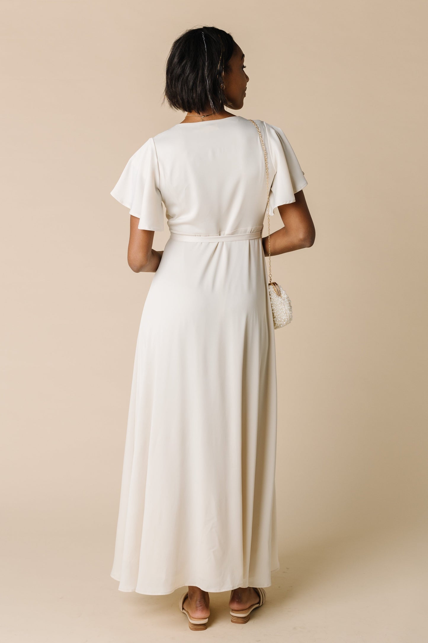 Back view of cream maxi dress