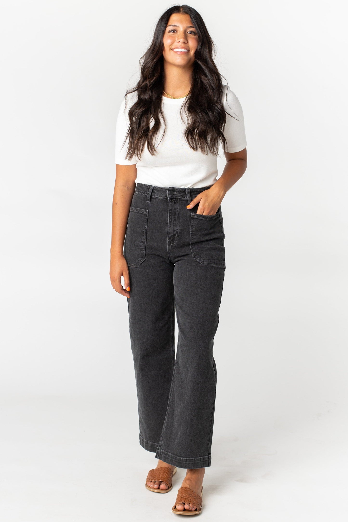 Modest black denim jeans with wide leg