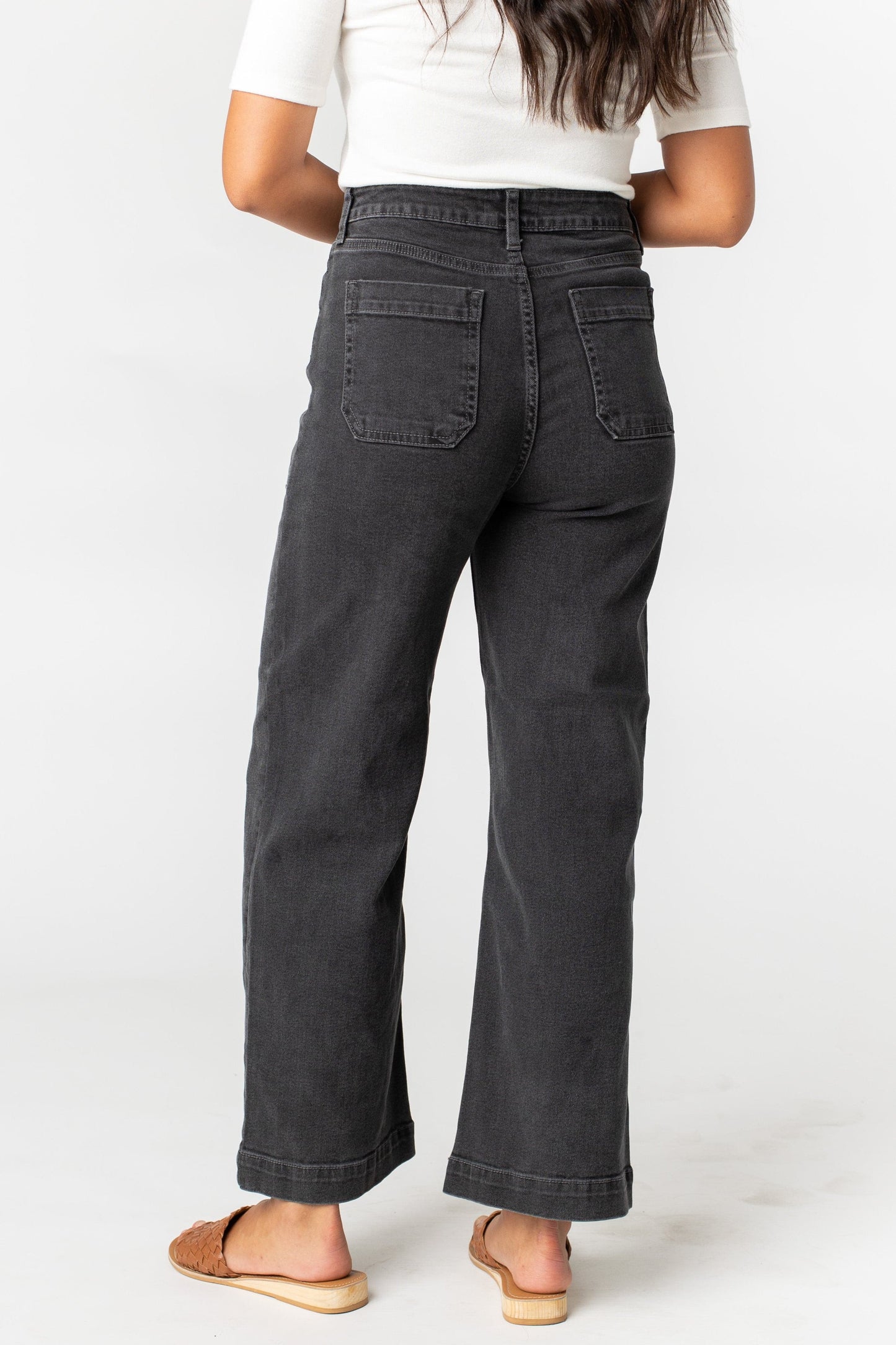 Back view of black denim jeans