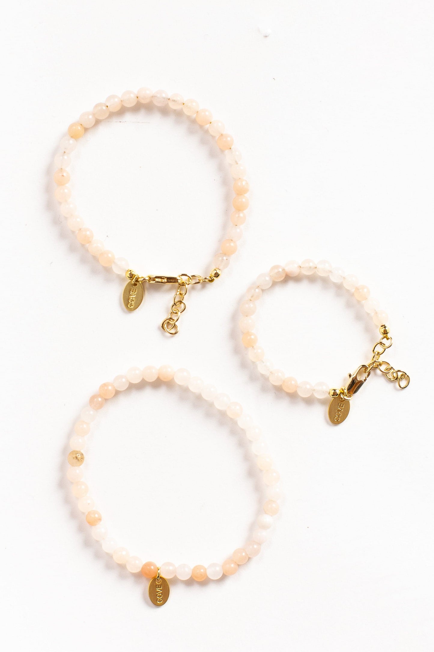 baby bracelet in round cream to tan colored beads