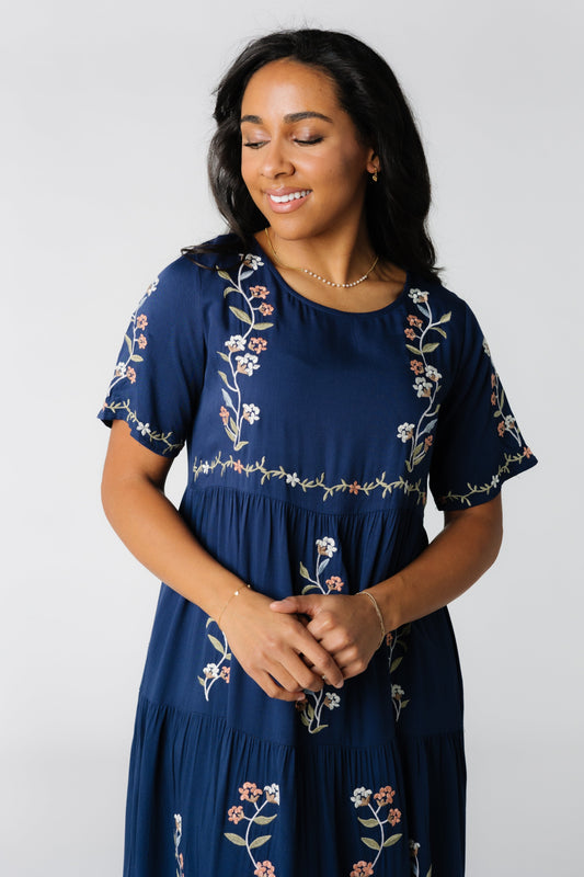 Embroidered midi dress with modest round neckline