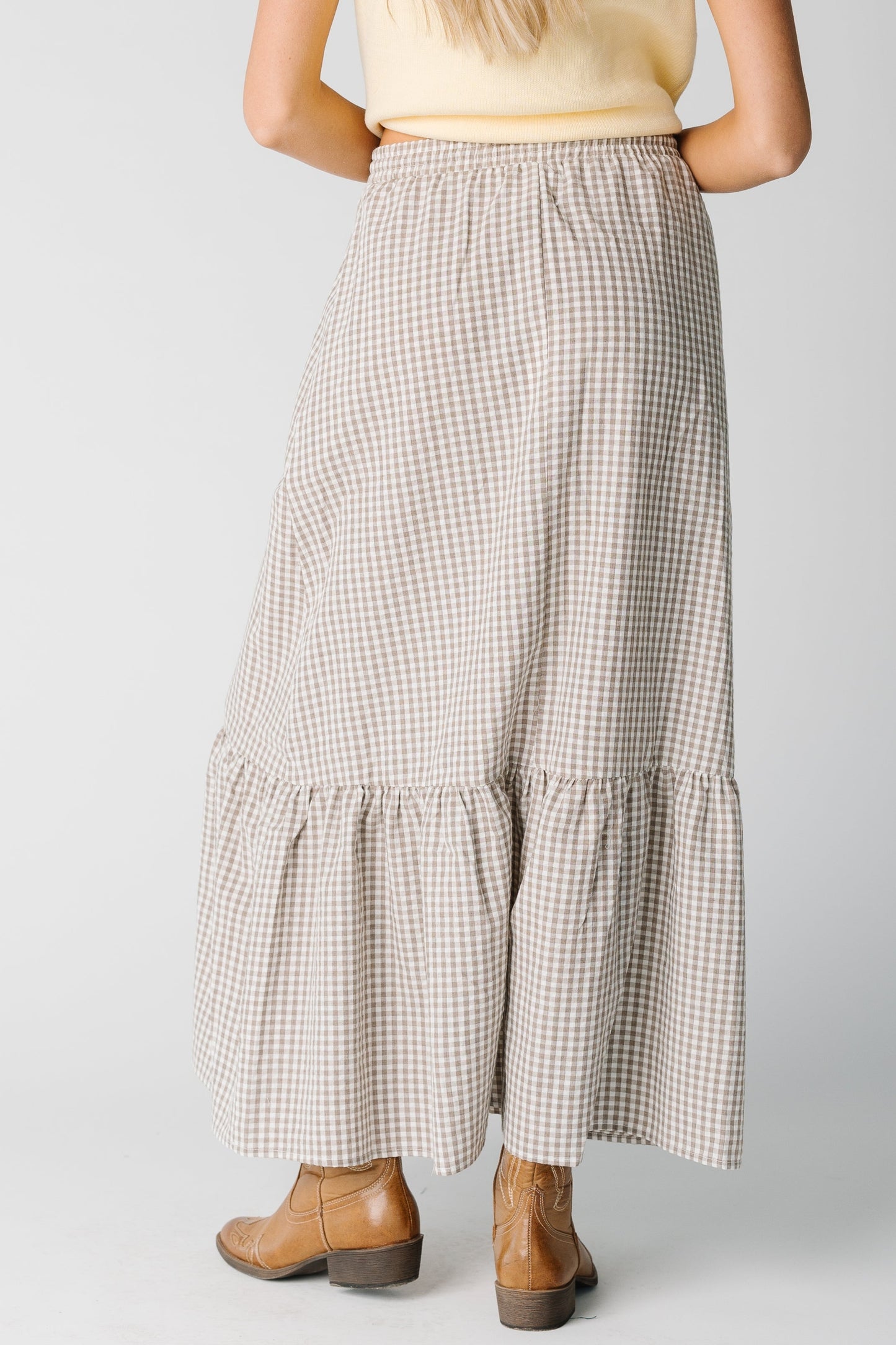 Back view of taupe gingham maxi skirt