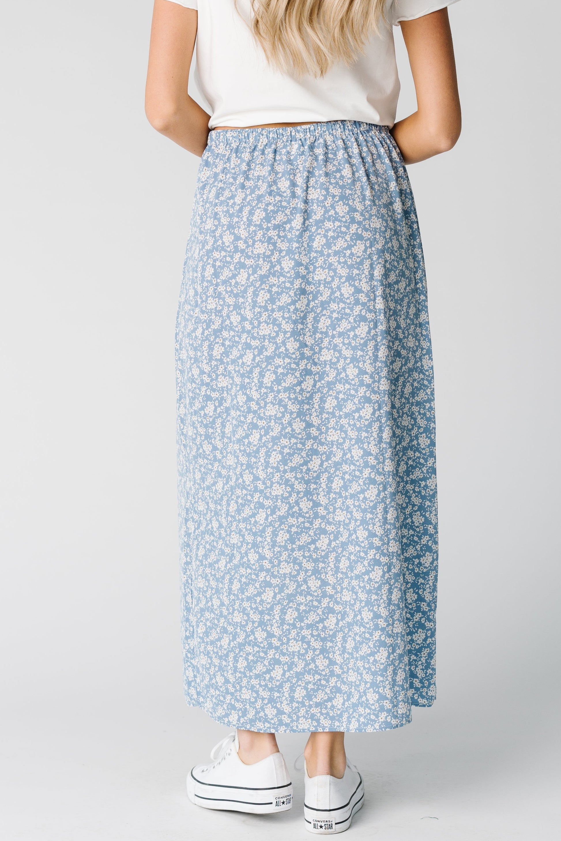 Back view of blue floral A-line maxi