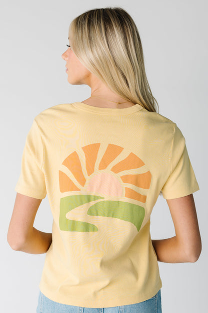 Back view of graphic on yellow RVCA Daily Tee 23B351502