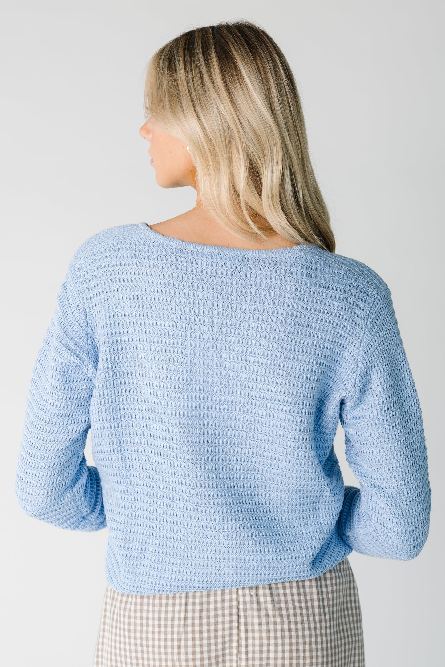 Back view of light blue long sleeve cardigan