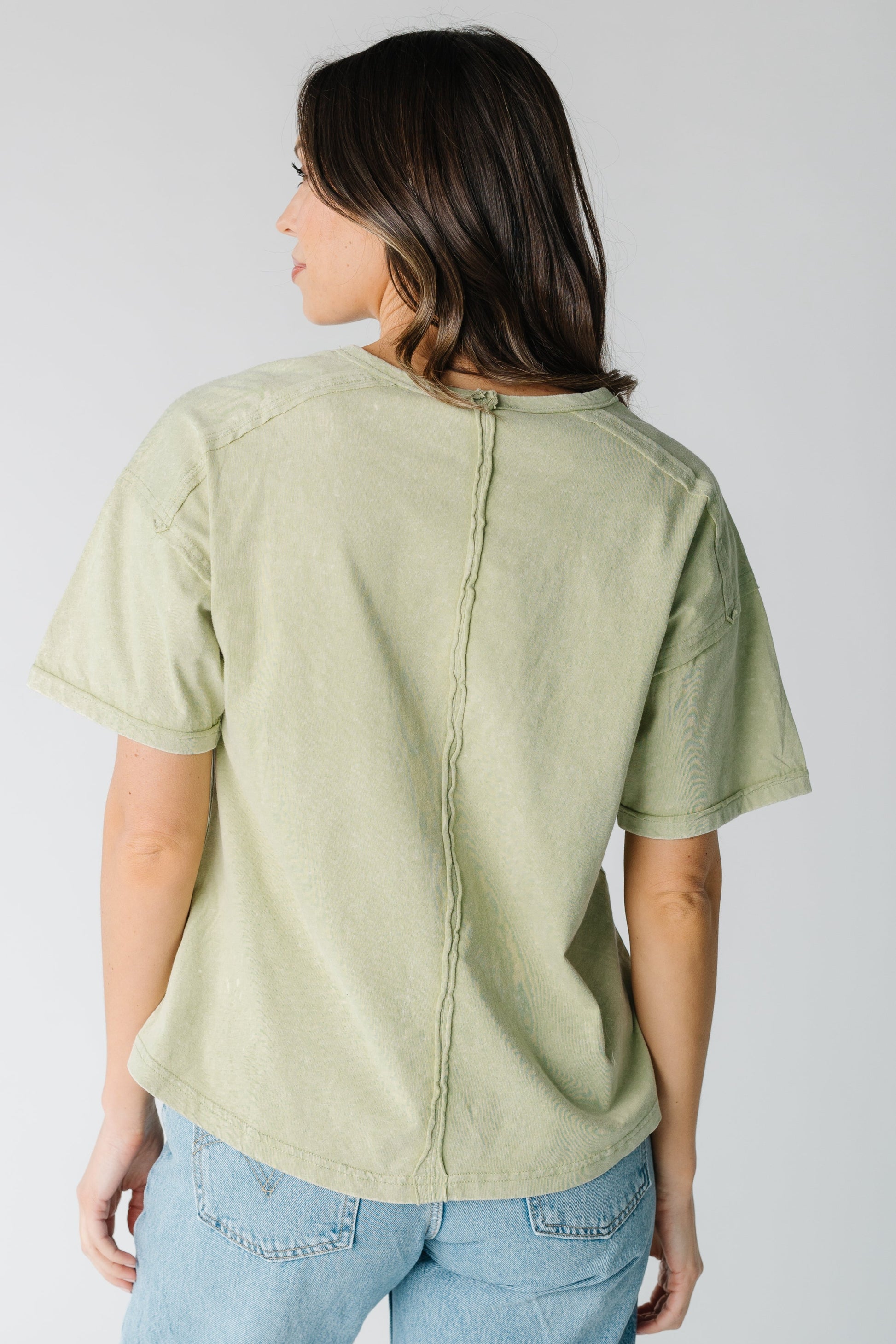 Back view of light green short sleeve tee