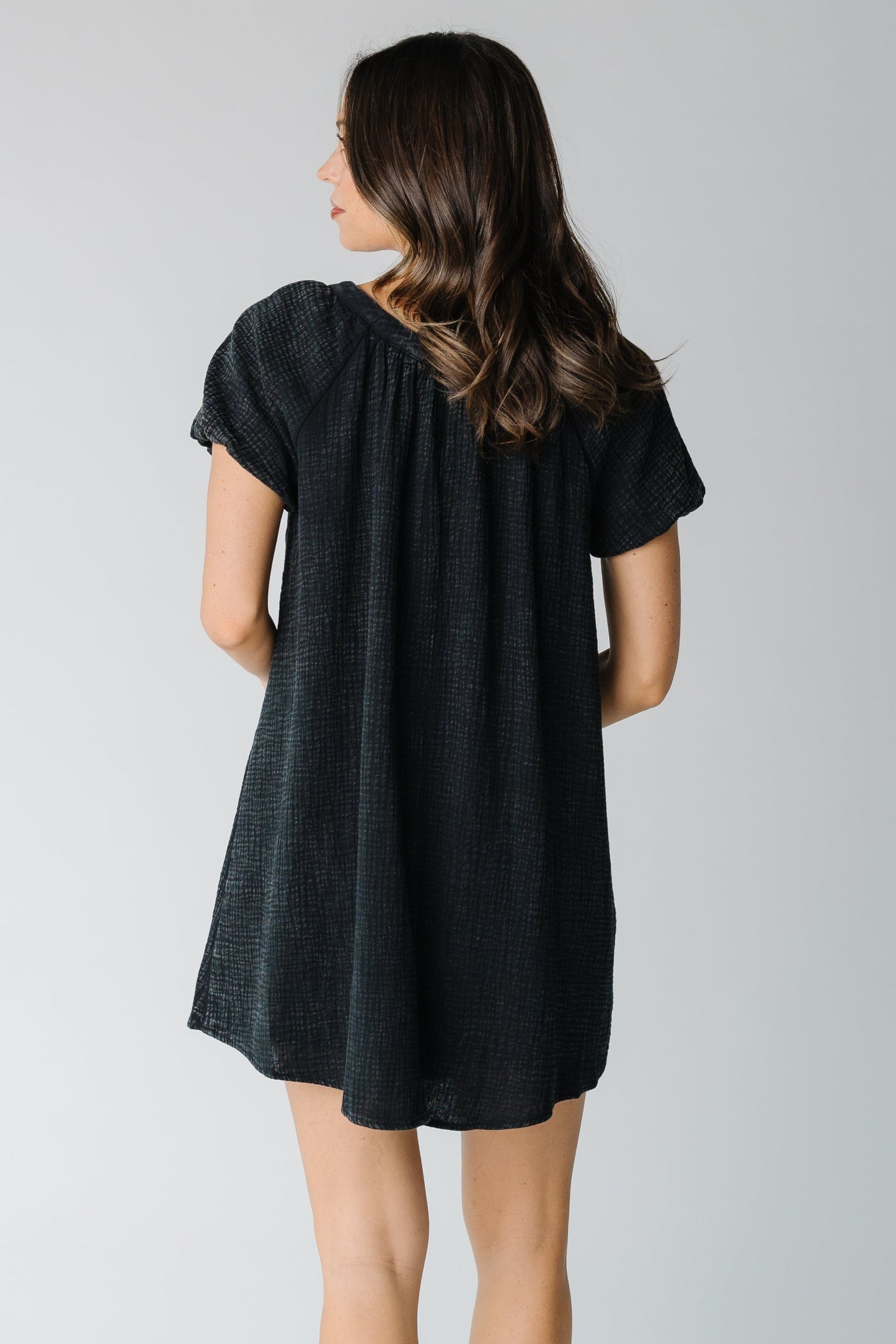 Back view of washed black dress with short sleeves