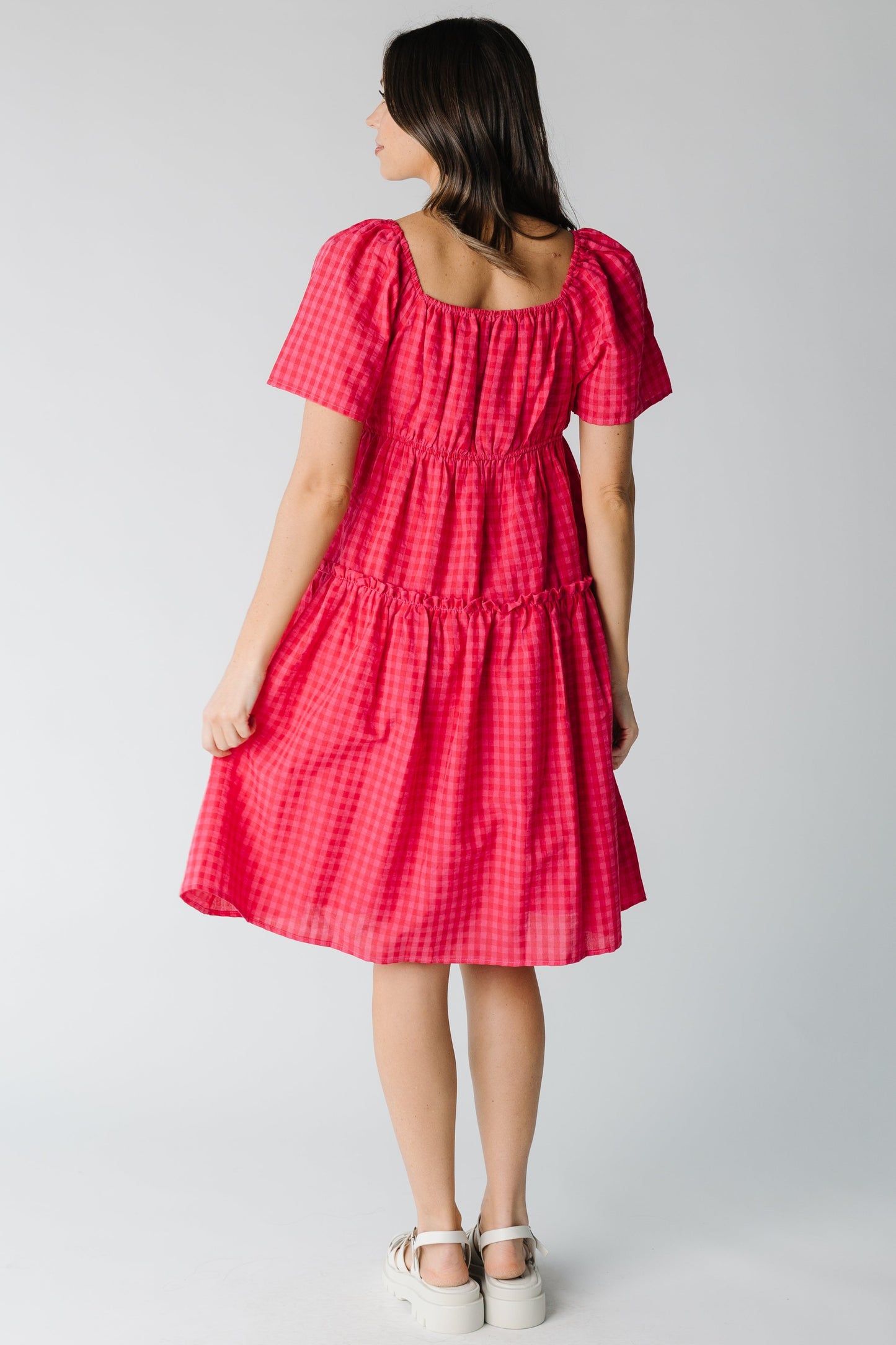 Back view of fuchsia gingham dress