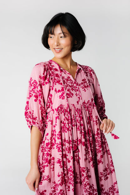 Modest pin prink print with slit neckline with ties and elbow length sleeves