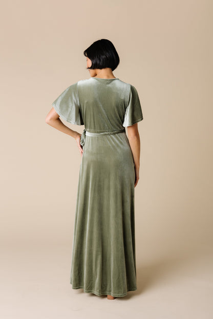 Back view of sage velvet maxi dress