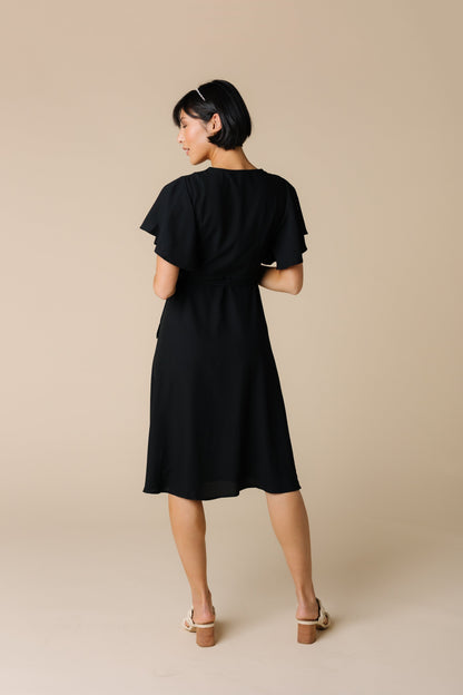 Back view of black bridesmaid dress with flutter sleeves