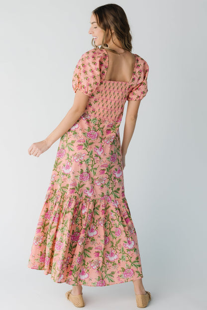 Back view of pink floral midi with square back neckline with puff sleeve