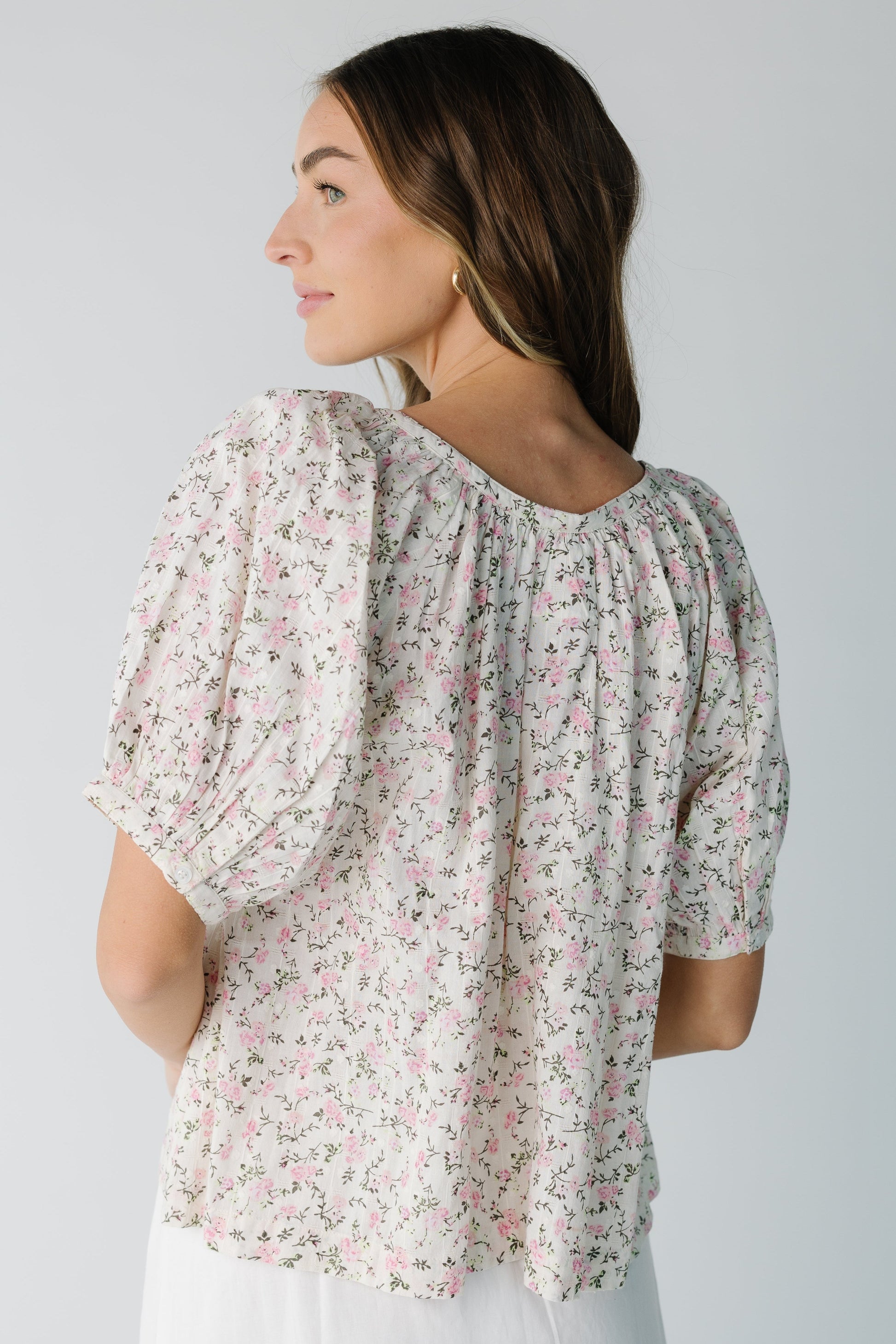 Back view of pink floral print flowy top