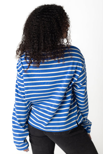 Back view of blue and white stripe long sleeve top