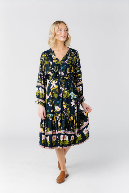 Modest floral dress with V-neckline with ties, and long sleeves