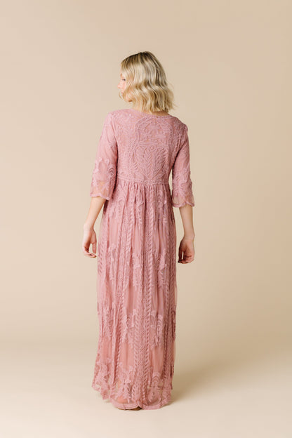 Back view of all lace maxi bridesmaid dress in rose pink