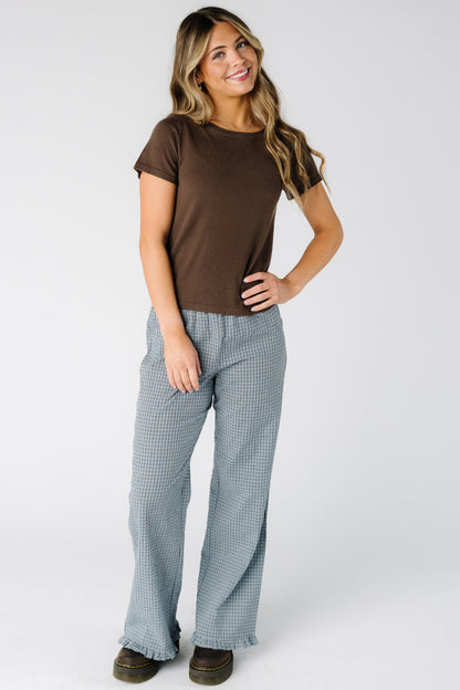 The Delta Ruffle Pants  in blue plaid for women and teens