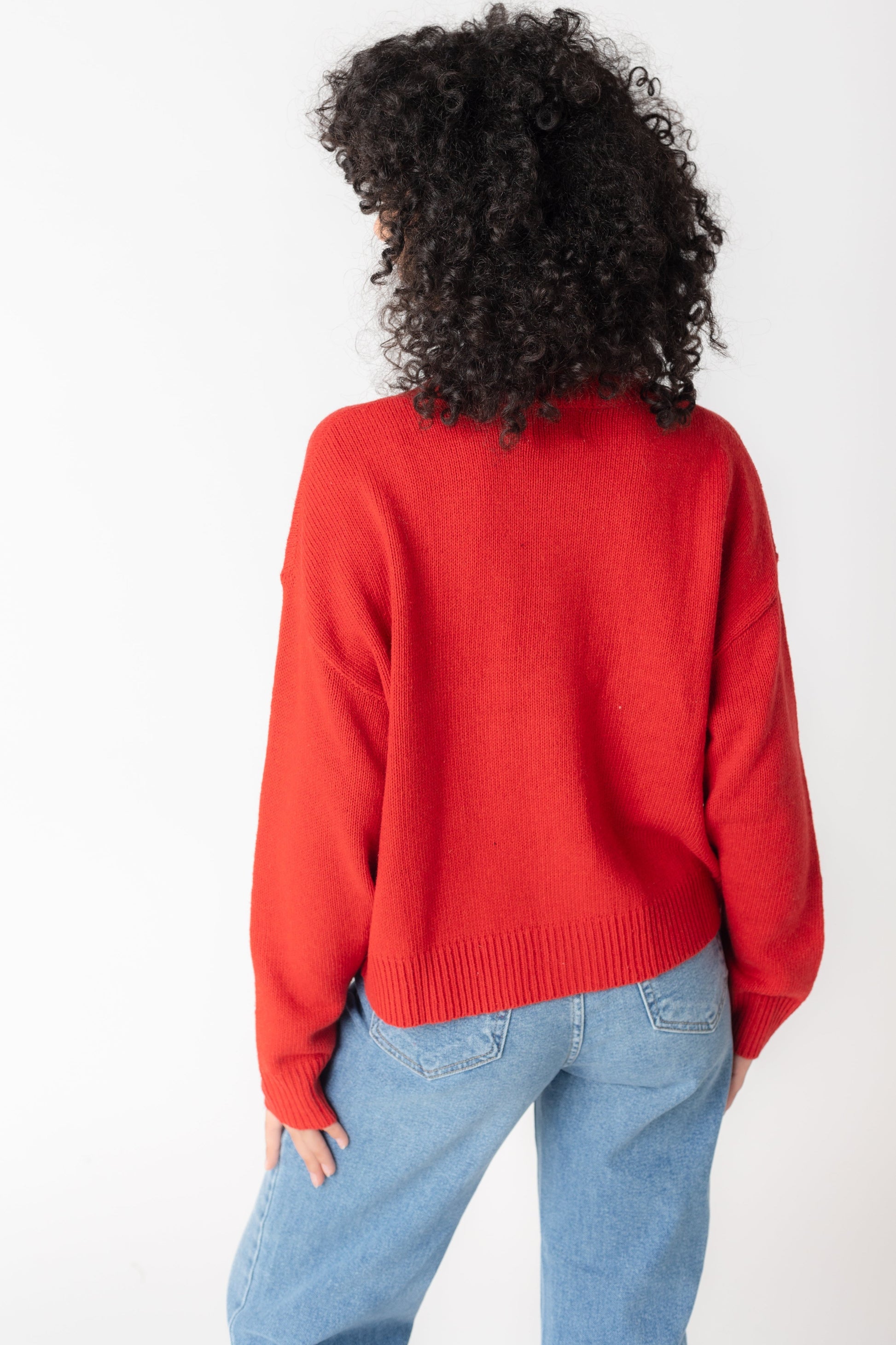 Back view of red long sleeve cardigan