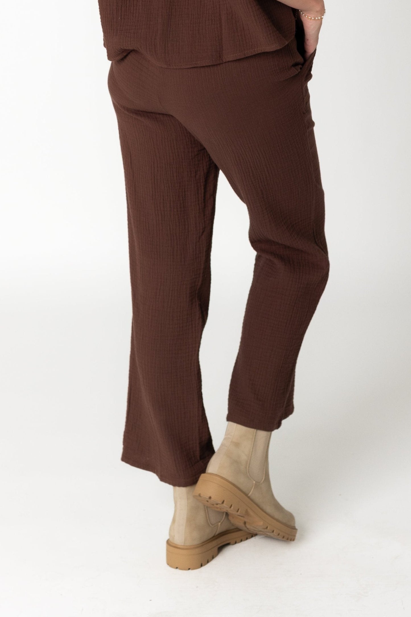 Back view of brown gauzy wide leg pant