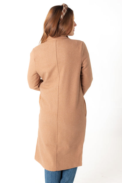 Back view of camel midi coat with long sleeves