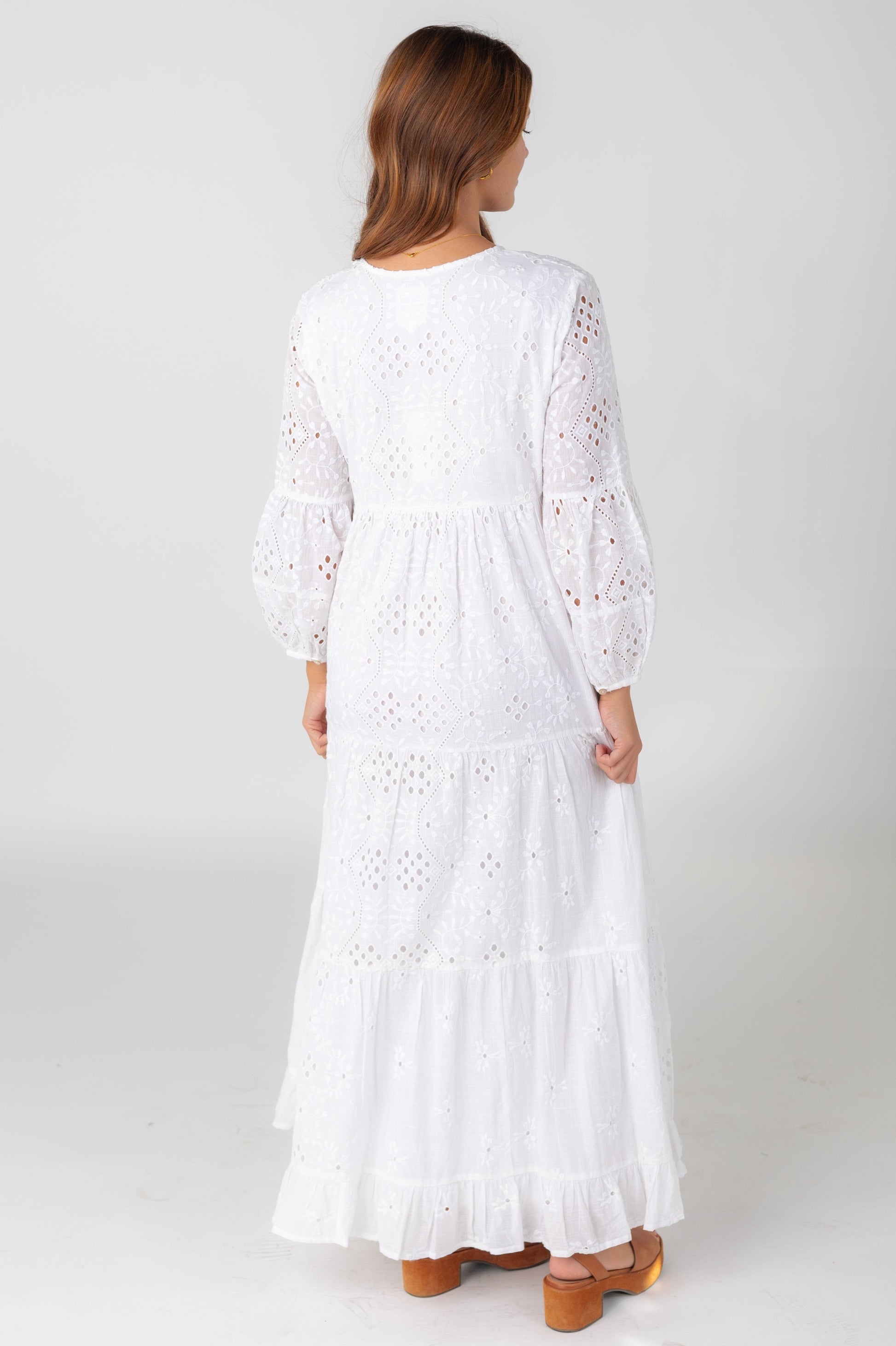 Back view of  tiered eyelet maxi with long sleeves