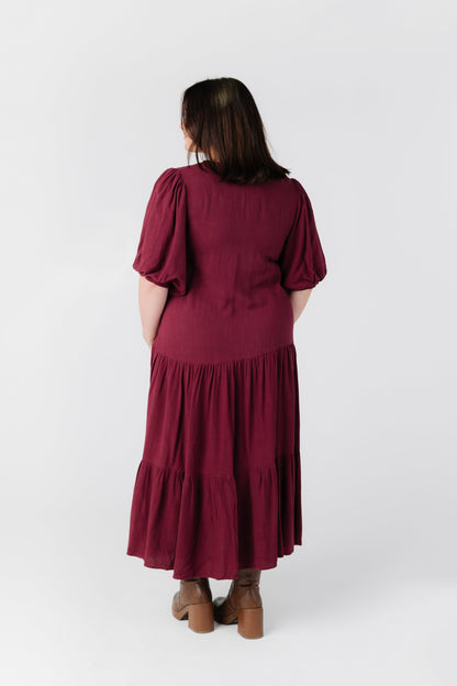 Back view of Lara plus size midi dress with elbow length sleeves