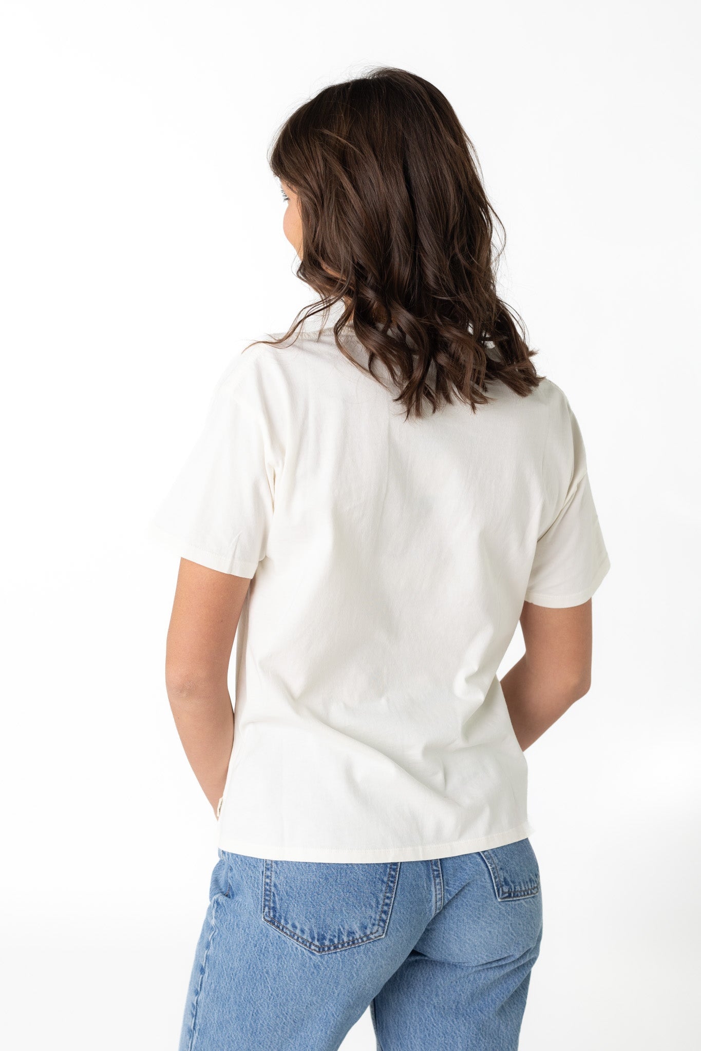 Back view of white short sleeve Alchemy tee by Rip Curl