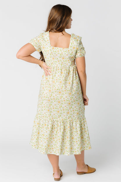 Back view of yellow print midi plus size dress