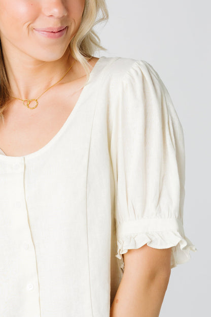 close view cream top with short puff sleeves and ruffle cuff