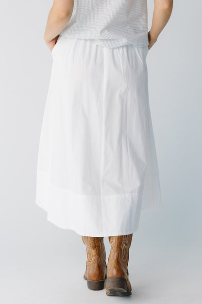 Back view of white woven midi skirt