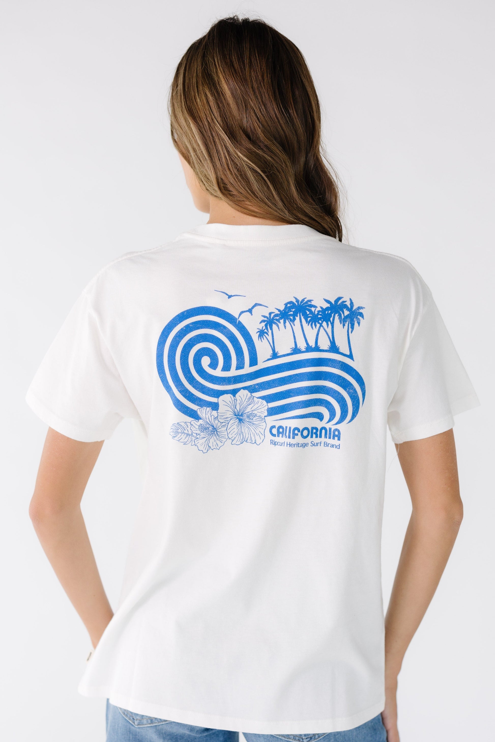 Rip Curl Ocean Break Relaxed Tee in white and teens. 