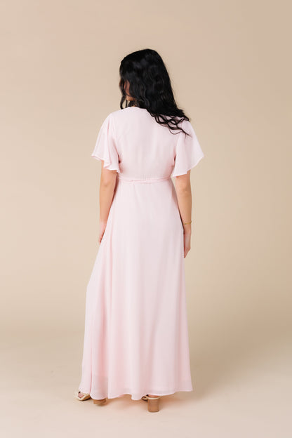 Back view of lt pink maxi dress with short flutter sleeves